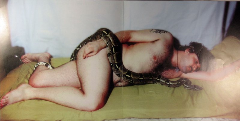 Hank von Helvete with a cobra on Ass Cobra artwork