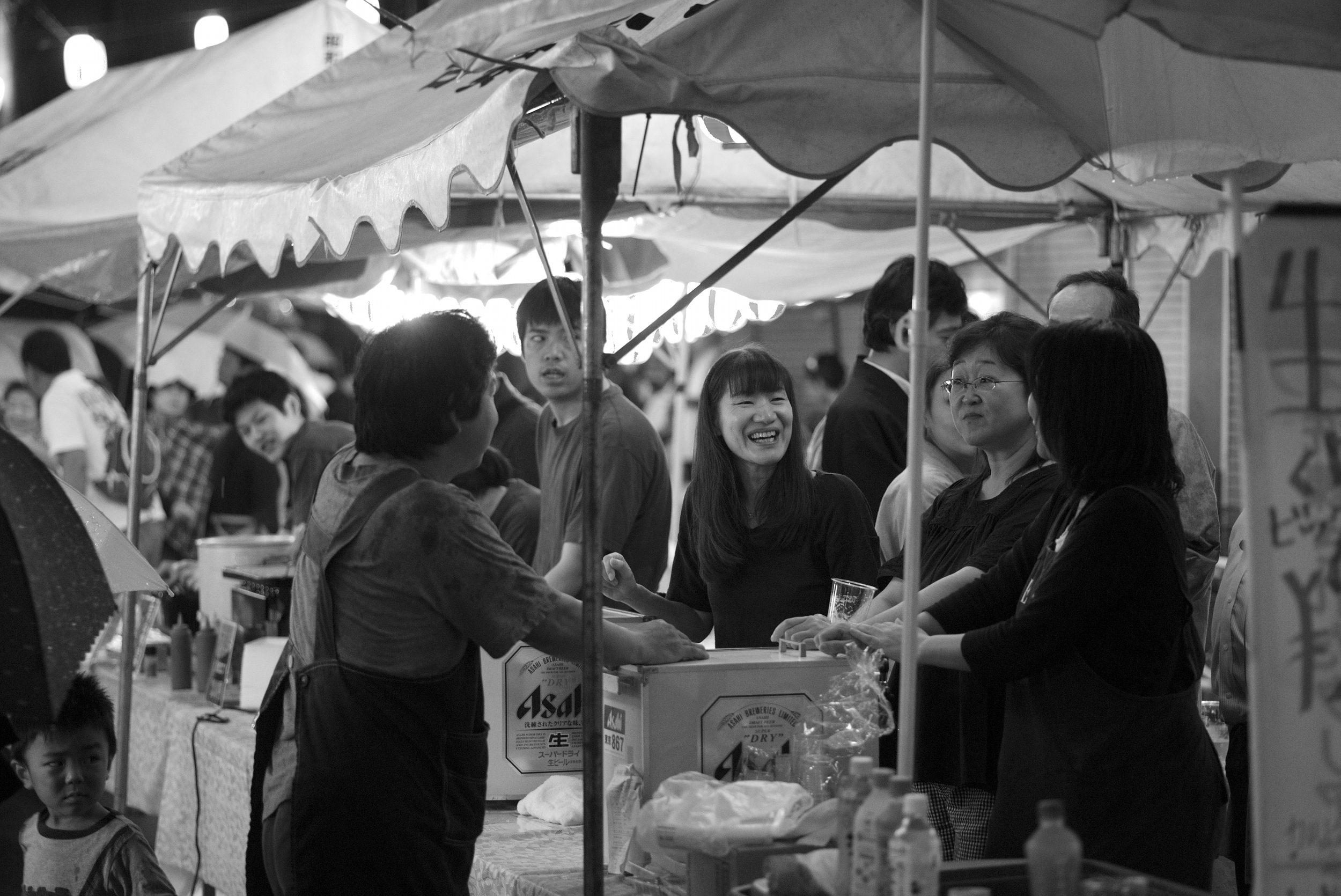 People selling and drinking beer