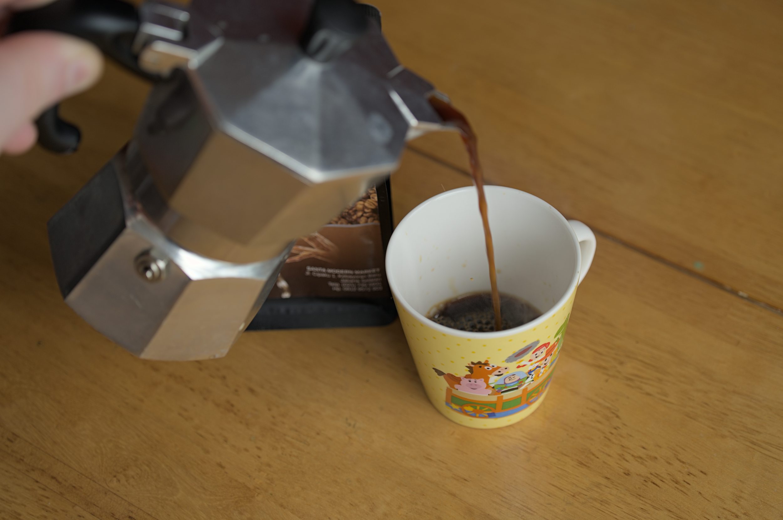 Pouring coffee into the mug